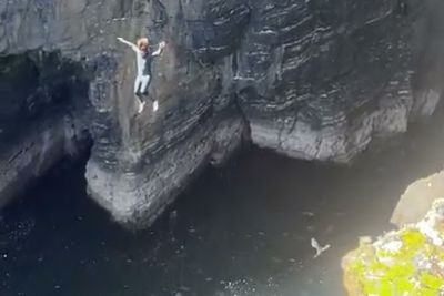 Lad Lands On A Bird After Jumping Off Big Cliff In Scotland