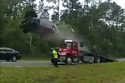 Distracted Florida Driver Launches Car Off Tow Truck Ramp