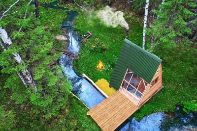 Man Builds A Cosy Tiny House On The River Bank