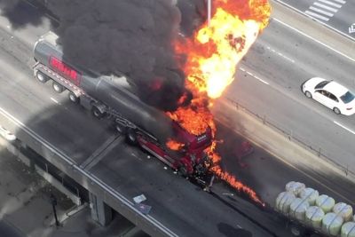 Man Tries To Rescue A Truck Driver After A Fiery Crash