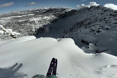 Skier falls through a 60 foot hole in the mountains