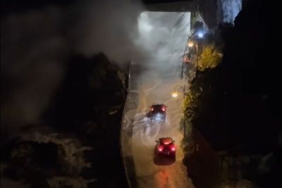 Close call as waves flood coastal road in Italy