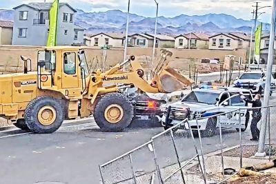 Man steals bulldozer and rams police cars in Nevada