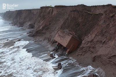 Nuclear bunker hung above a beach – now it has finally collapsed