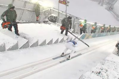 Ben Loomis hits snow blower during Olympic jump
