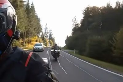 Motorcyclist Speeds Off Mountain Road and Through Forest in Viral Video